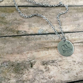 Retro roller skates charm necklace
