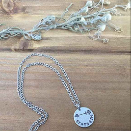 Strength arrow stamped charm necklace