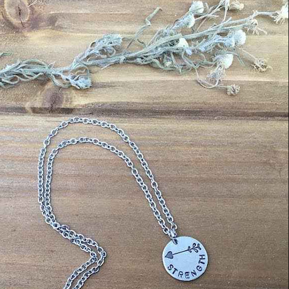 Strength arrow stamped charm necklace